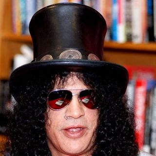 Slash of Velvet Revolver and Guns N' Roses Signs Copies of His Book "Slash" at Borders Books