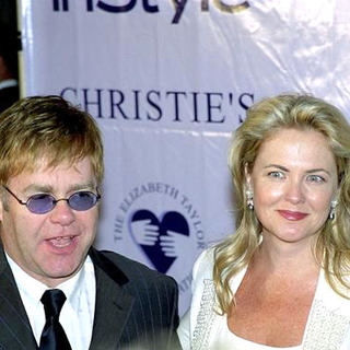 Elton John;Cornelia Guest; in Elizabeth Taylor's Jewelry Auction