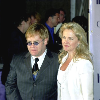 Elton John;Cornelia Guest; in Elizabeth Taylor's Jewelry Auction