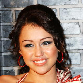 Miley Cyrus; in Verizon and People Honor Timbaland
