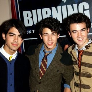 Jonas Brothers; in "Burning Up: On Tour With The Jonas Brothers" Book Party