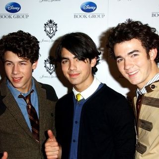 Jonas Brothers; in "Burning Up: On Tour With The Jonas Brothers" Book Party