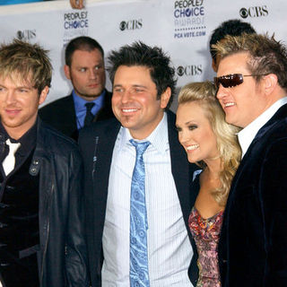 Carrie Underwood;Rascal Flatts; in 35th Annual People's Choice Awards - Arrivals
