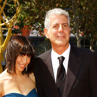 Anthony Bourdain;Ottavia Busia; in 61st Annual Primetime Creative Arts Emmy Awards - Arrivals