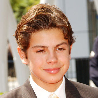 Jake T. Austin; in 61st Annual Primetime Creative Arts Emmy Awards - Arrivals