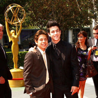 Jake T. Austin, David Henrie in 61st Annual Primetime Creative Arts Emmy Awards - Arrivals