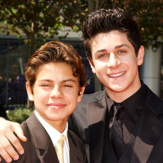 Jake T. Austin, David Henrie in 61st Annual Primetime Creative Arts Emmy Awards - Arrivals