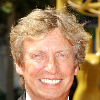 Nigel Lythgoe; in 61st Annual Primetime Creative Arts Emmy Awards - Arrivals