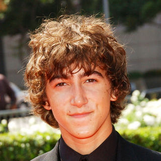 Vincent Martella; in 61st Annual Primetime Creative Arts Emmy Awards - Arrivals