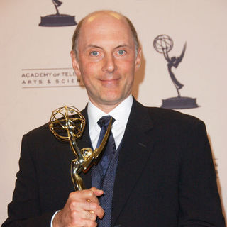 Dan Castellaneta; in 61st Annual Primetime Creative Arts Emmy Awards - Press Room