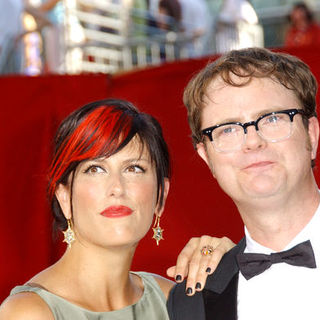 Rainn Wilson, Holiday Reinhorn in The 61st Annual Primetime Emmy Awards - Arrivals