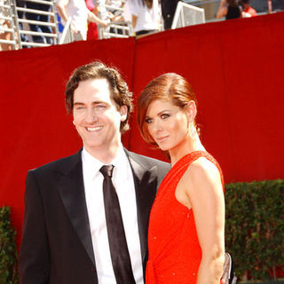 Daniel Zelman, Debra Messing in The 61st Annual Primetime Emmy Awards - Arrivals