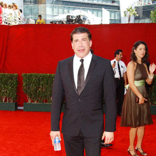 Bryan Batt; in The 61st Annual Primetime Emmy Awards - Arrivals