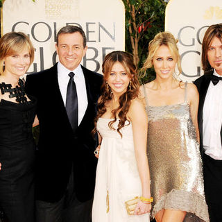 Miley Cyrus;Billy Ray Cyrus;Robert Iger;Tish Cyrus; in 66th Annual Golden Globes - Arrivals