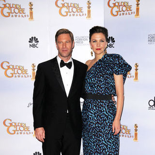 Aaron Eckhart;Maggie Gyllenhaal; in 66th Annual Golden Globes - Press Room