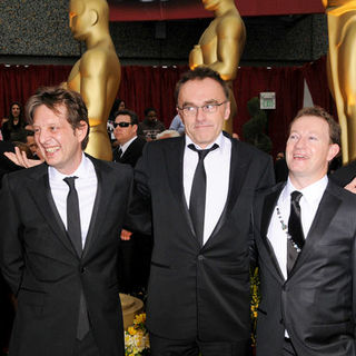 Simon Beaufoy, Danny Boyle, Christian Colson in 81st Annual Academy Awards - Arrivals