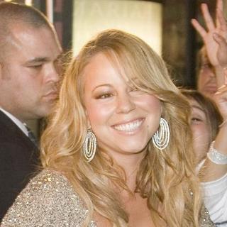 Mariah Carey; in Mariah Carey Autographs Copies Of Her New CD The Emancipation Of Mimi Platinum Edition