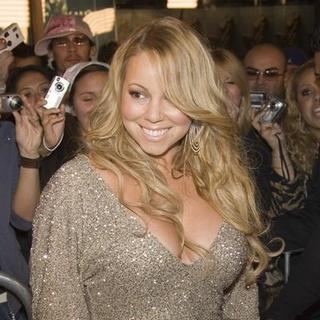 Mariah Carey; in Mariah Carey Autographs Copies Of Her New CD The Emancipation Of Mimi Platinum Edition