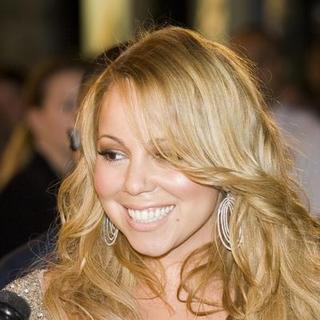 Mariah Carey; in Mariah Carey Autographs Copies Of Her New CD The Emancipation Of Mimi Platinum Edition