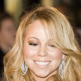 Mariah Carey; in Mariah Carey Autographs Copies Of Her New CD The Emancipation Of Mimi Platinum Edition