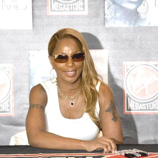 Mary J. Blige; in Mary J. Blige Signs Her Latest Hit CD The Breakthrough