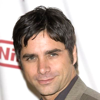 John Stamos; in Starlight Starbright Children's Foundation Honor Dakota Fanning at A Stellar Night Gala - Arrivals