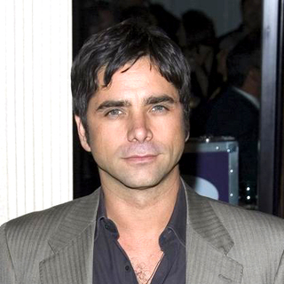 John Stamos; in Starlight Starbright Children's Foundation Honor Dakota Fanning at A Stellar Night Gala - Arrivals