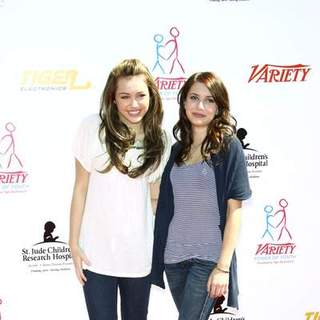 Emma Roberts;Miley Cyrus; in Variety's Power of Youth event benefiting St. Jude Children's Hospital