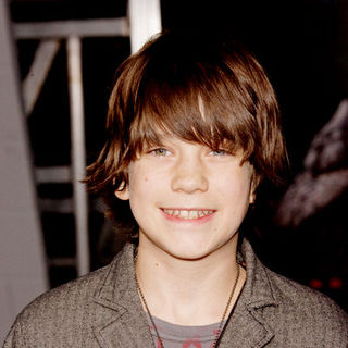 Liam James; in "2012" Los Angeles Premiere - Arrivals