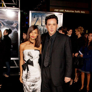 John Cusack, Thandie Newton in "2012" Los Angeles Premiere - Arrivals