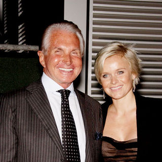 George Hamilton;Barbara Strum; in "2012" Los Angeles Premiere - Arrivals