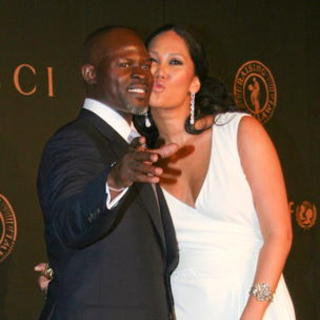 Kimora Lee Simmons;Djimon Honsou; in Madonna and Gucci Host "A Night to Benefit Raising Malawi and UNICEF" - Arrivals