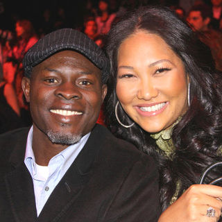 Djimon Hounsou, Kimora Lee Simmons in Mercedes-Benz Fashion Week Fall 2009 - Barbie Runway Show - Runway and Front Row