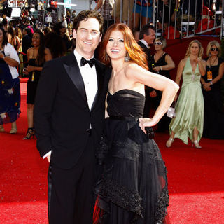 Debra Messing; in 60th Primetime EMMY Awards - Arrivals