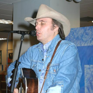 Dwight Yoakam; in Dwight Yoakam Performs and Signs Blame The Vain his New Album