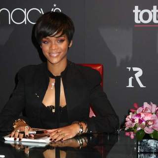 Rihanna in Rihanna Launches Umbrella Line From Totes at Macy's in New York City