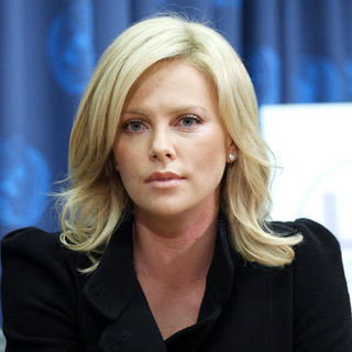 Charlize Theron in Charlize Theron Inducted as a United Nations Messenger of Peace - Panel Discussion