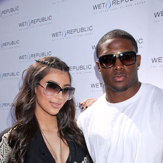 Kim Kardashian;Reggie Bush; in Kim Kardashian Splashes in the Pool Season at Wet Republic in Las Vegas on March 28, 2009