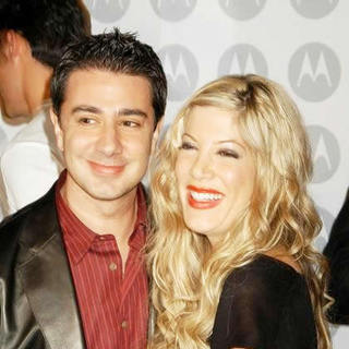 Tori Spelling;Charlie Shanian; in Motorola's 5th Anniversary Party Benefiting Toys for Tots