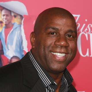 Magic Johnson; in Screen Gems Presents the World Premiere of "This Christmas"