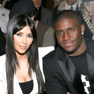 Kim Kardashian;Reggie Bush; in Mercedes-Benz Fashion Week Fall 2009 - Y-3 Autumn/Winter 2009-2010 Fashion Show - Front Row