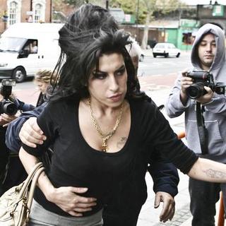 Amy Winehouse in Amy Winehouse and Pete Doherty at the Thames Magistrates Court in London on November 10, 2007