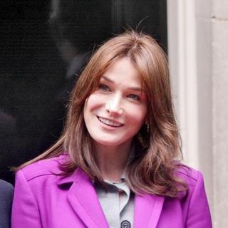 Carla Bruni in French President Nicolas Sarkozy Visits British Prime Minister Gordon Brown in London on March 27, 2