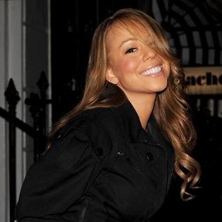 Mariah Carey; in Mariah Carey Promotes Her New Single "Touch My Body" at Selfridges in London
