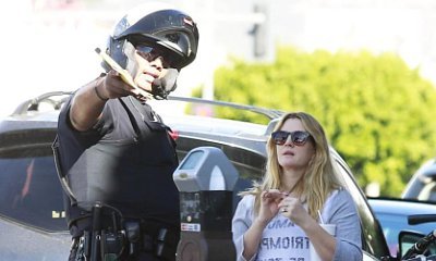 Drew Barrymore Is Cited for Jaywalking
