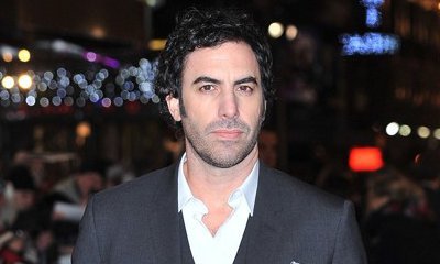 Sacha Baron Cohen Returns to Freddie Mercury Biopic as Director, Writer, and Lead Star