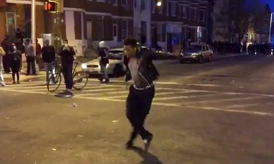 Video: Man Dances to Michael Jackson's 'Beat It' During Baltimore Riots