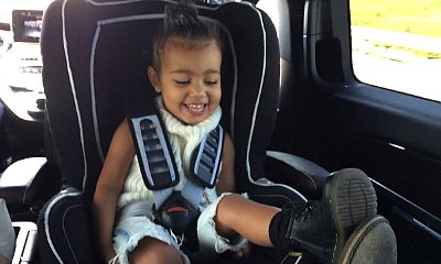 North West Plays Footsie With Dad Kanye West in Adorable Picture