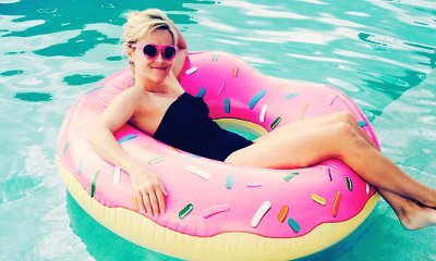 Reese Witherspoon Enjoys Easter Weekend Basking in the Sun