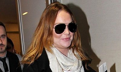 Lindsay Lohan Spotted Carrying Quran During an Outing in Brooklyn